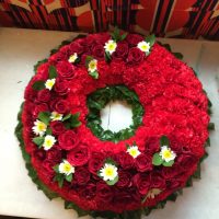 funeral wreath, red, roses, carnations, chrysanthamums