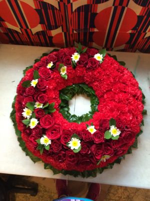 funeral wreath, red, roses, carnations, chrysanthamums